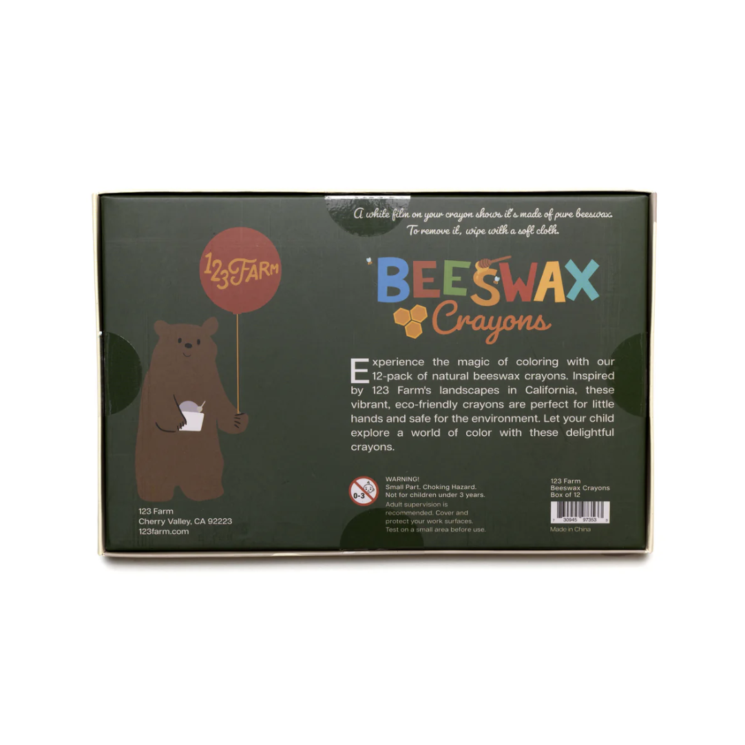Box of beeswax crayons with a bear illustration and product details on a white background