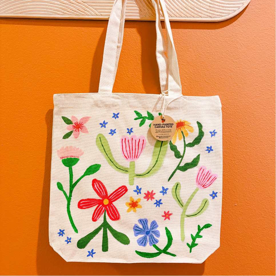 Canvas tote handprinted with flowers and stems