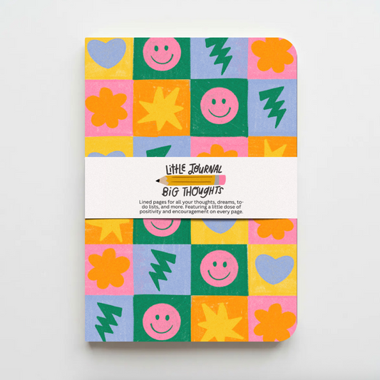 Colorful notebook with geometric patterns on a white background
