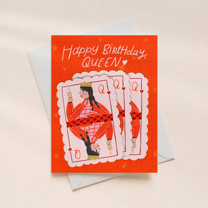 Birthday card with playing card design and 'Happy Birthday, Queen!' text on a beige background