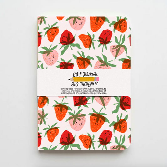Notebook with strawberry pattern on a white background