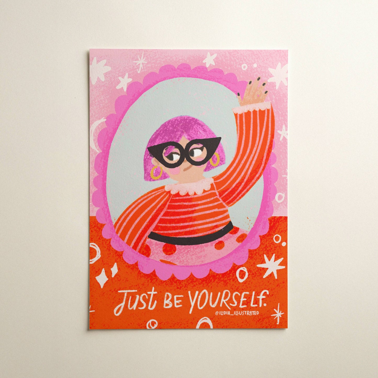 Poster with an illustration of a person wearing glasses and a quote 'Just be yourself' on a pink background.