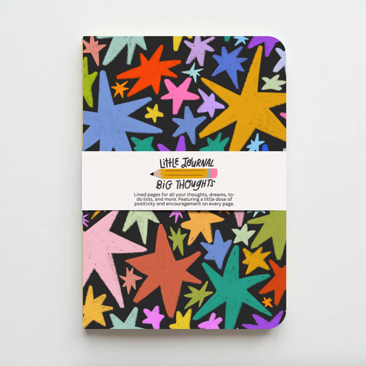 Colorful star-patterned notebook with 'Little Journal Big Thoughts' text on a white background