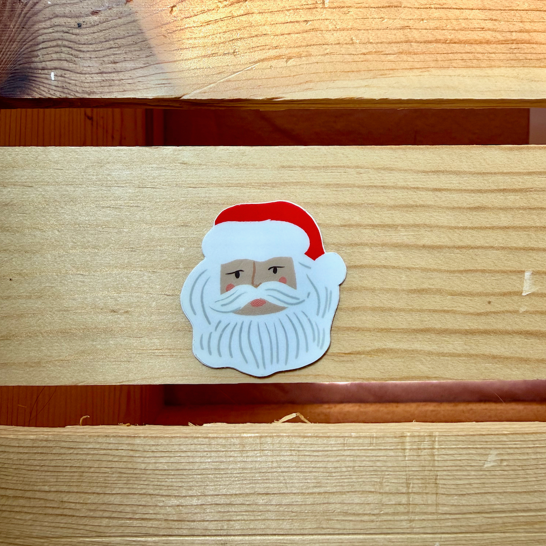 micro sticker of santas head.