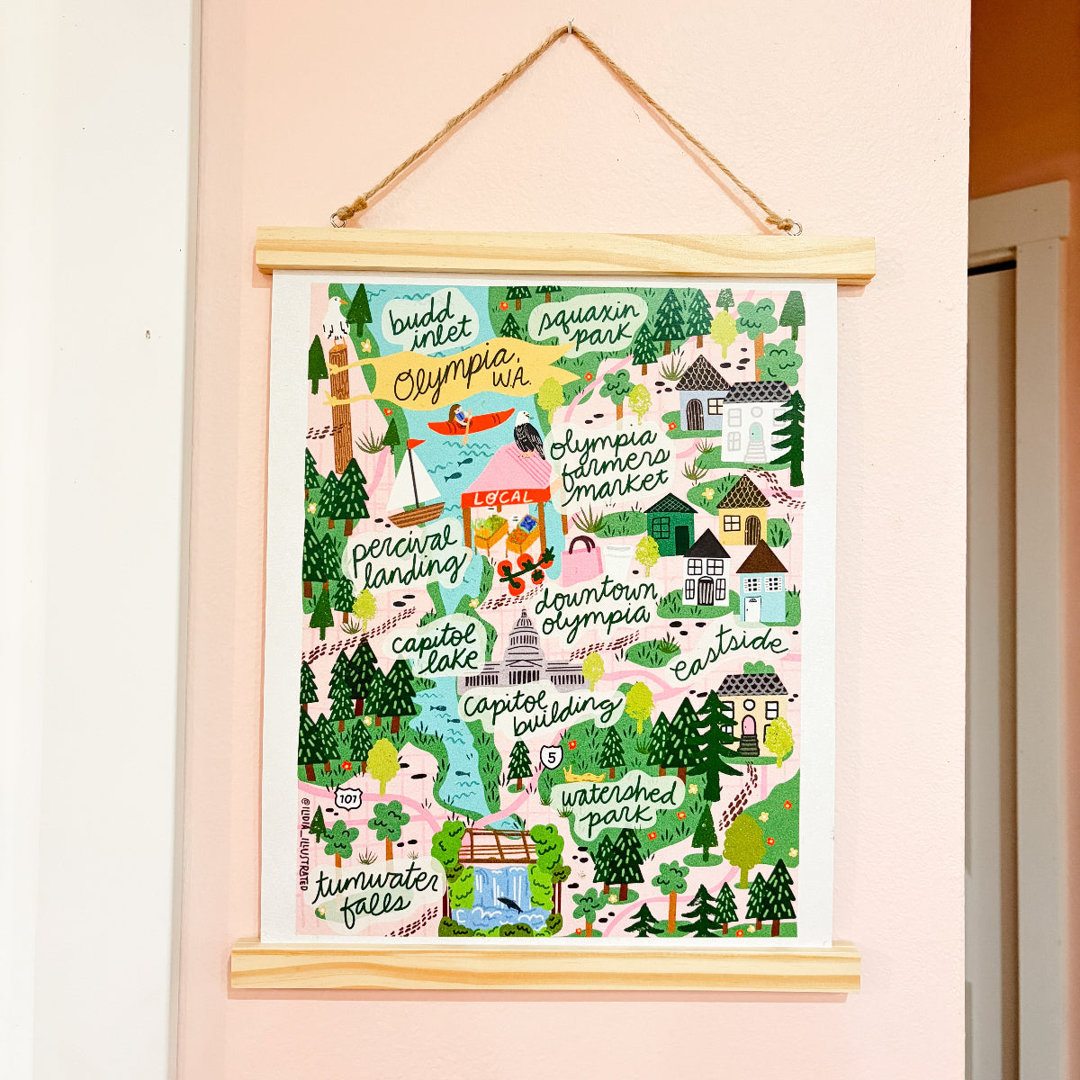 Illustrated map of Olympia Washington hanging on a pink wall