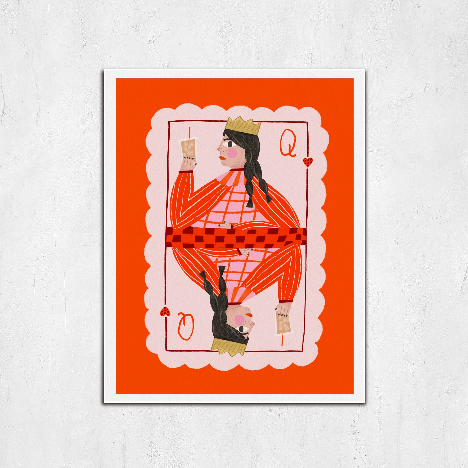 Framed artwork of a stylized card with a person on an orange background