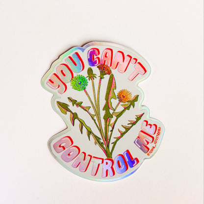 Sticker with floral design and text 'YOU CAN'T CONTROL ME' on a light pink background