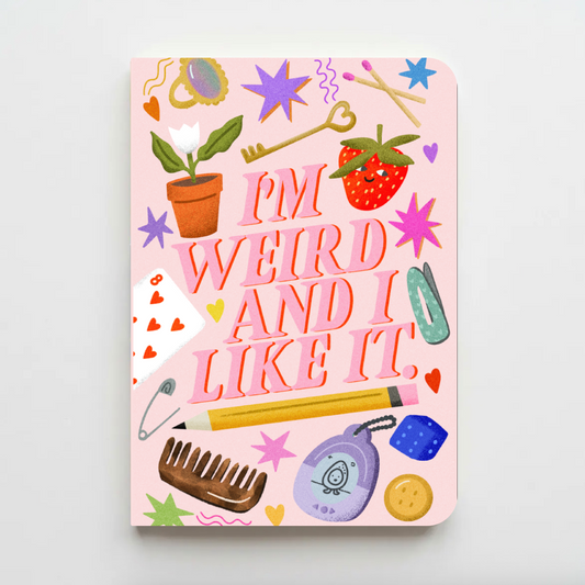Notebook with colorful illustrations and text on a pink background Im weird