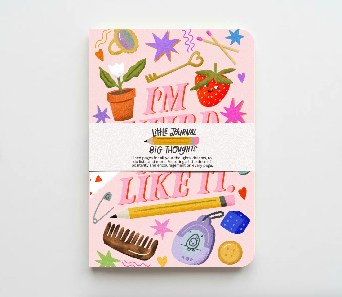Pink journal with colorful illustrations on a white background im weird and i like it journal