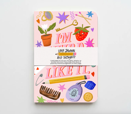 Pink journal with colorful illustrations on a white background im weird and i like it journal