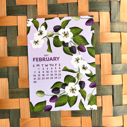 Calendar for February 2027 on a woven mat background