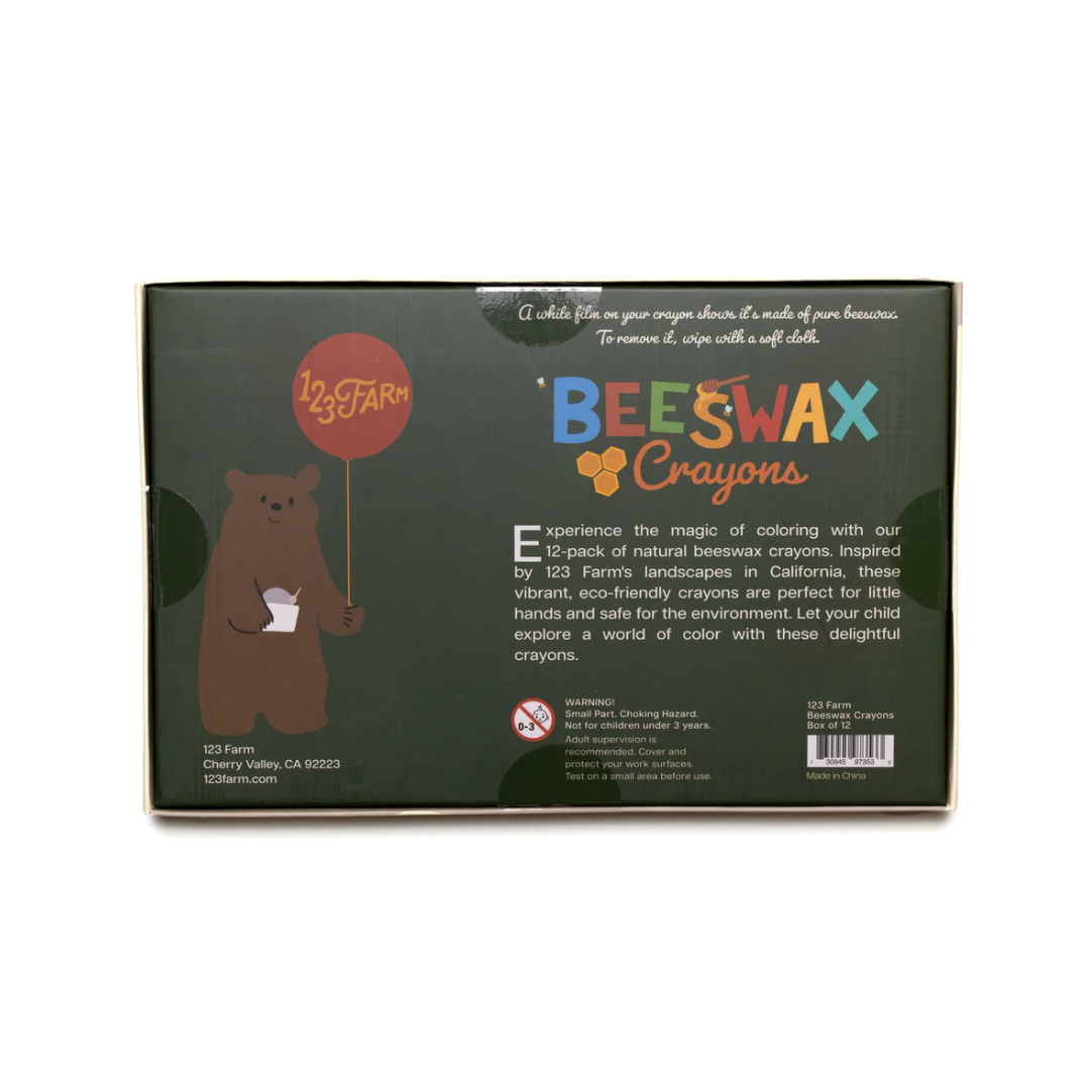 Box of beeswax crayons with a bear illustration and product details on a white background