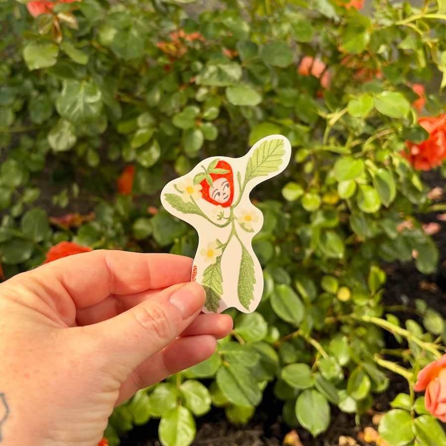 strawberry friend sticker with a floral background